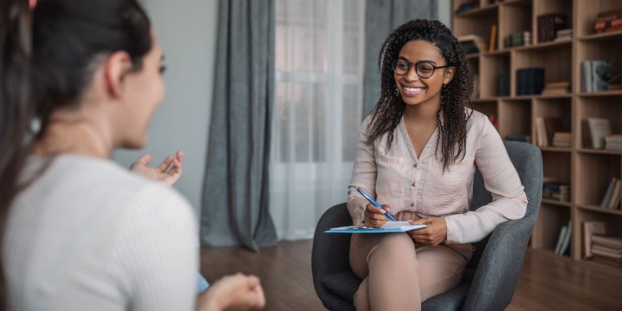A career counselor helping a student with her career choices.